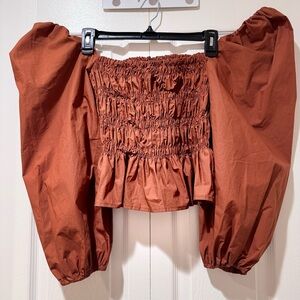 ASTR the label Rust Smocked Puff Sleeve Top. Size XS. NWT